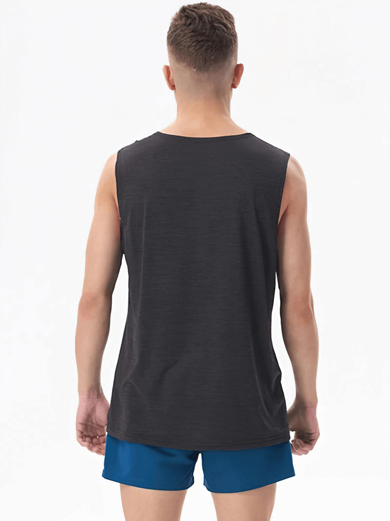 Back view of a man wearing a breathable black and blue gym tank top, made from lightweight polyester fabric - perfect for workouts.